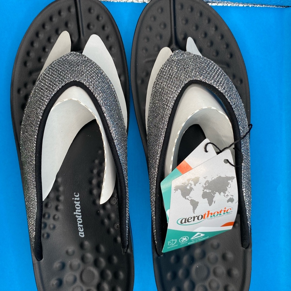 Sleek Black and Silver Sandals with Textured Design